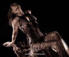 woman in lace bodysuit for a Boudoir Photography experience in Lincolnshire