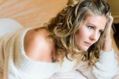 woman wearing slouchy sweater for Boudoir Photography Lincolnshire