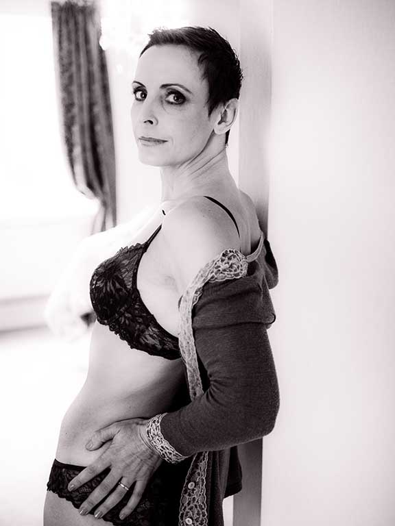 Boudoir photoshoot wearing slouchy sweater